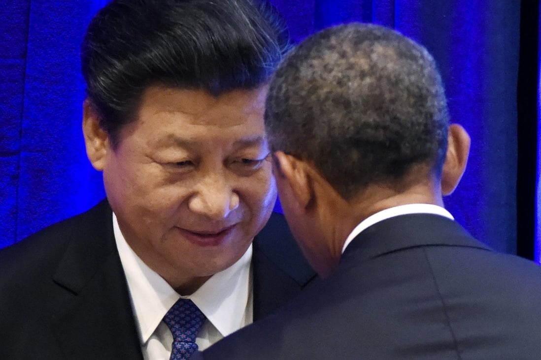 China's President Xi Jinping meets US President Barack Obama in Washington. The two countries have agreed to speed up work on a bilateral investment treaty. Photo: EPA