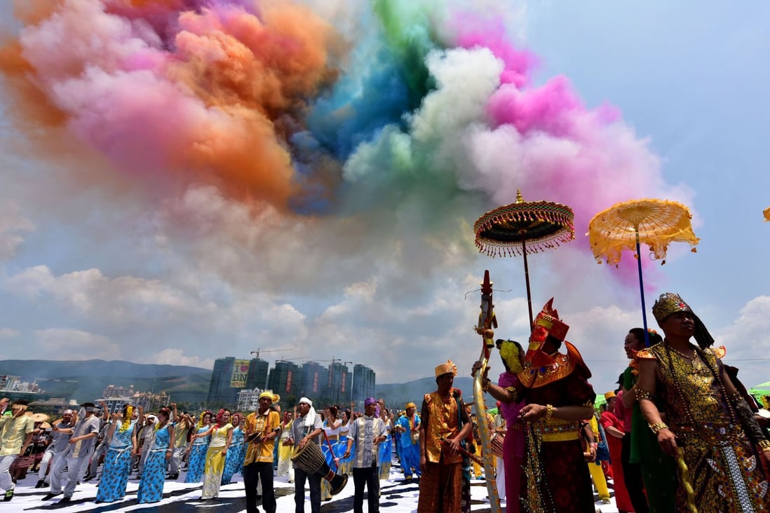Xishuangbanna is famous for its scenic beauty and colourful local traditions, which are drawing more domestic tourists to this and other parts of China each year. Photo: AFP