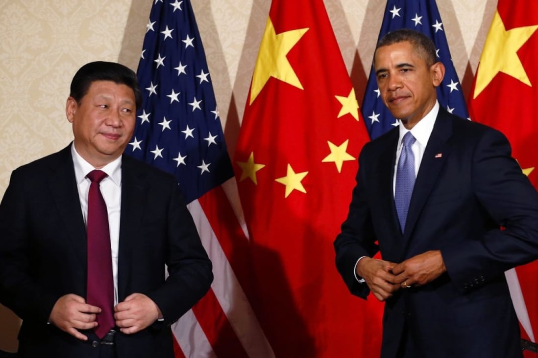 US President Barack Obama meets President Xi Jinping on the sidelines of a summit in The Hague in 2014. Photo: Reuters
