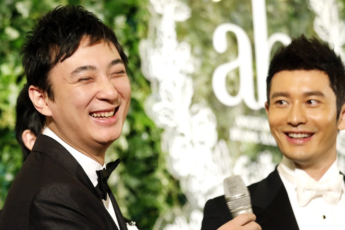 Chinese millionaire Wang Sicong, left, laughs during the wedding of Chinese actor Huang Xiaoming, right, in Shanghai. Photo: AP