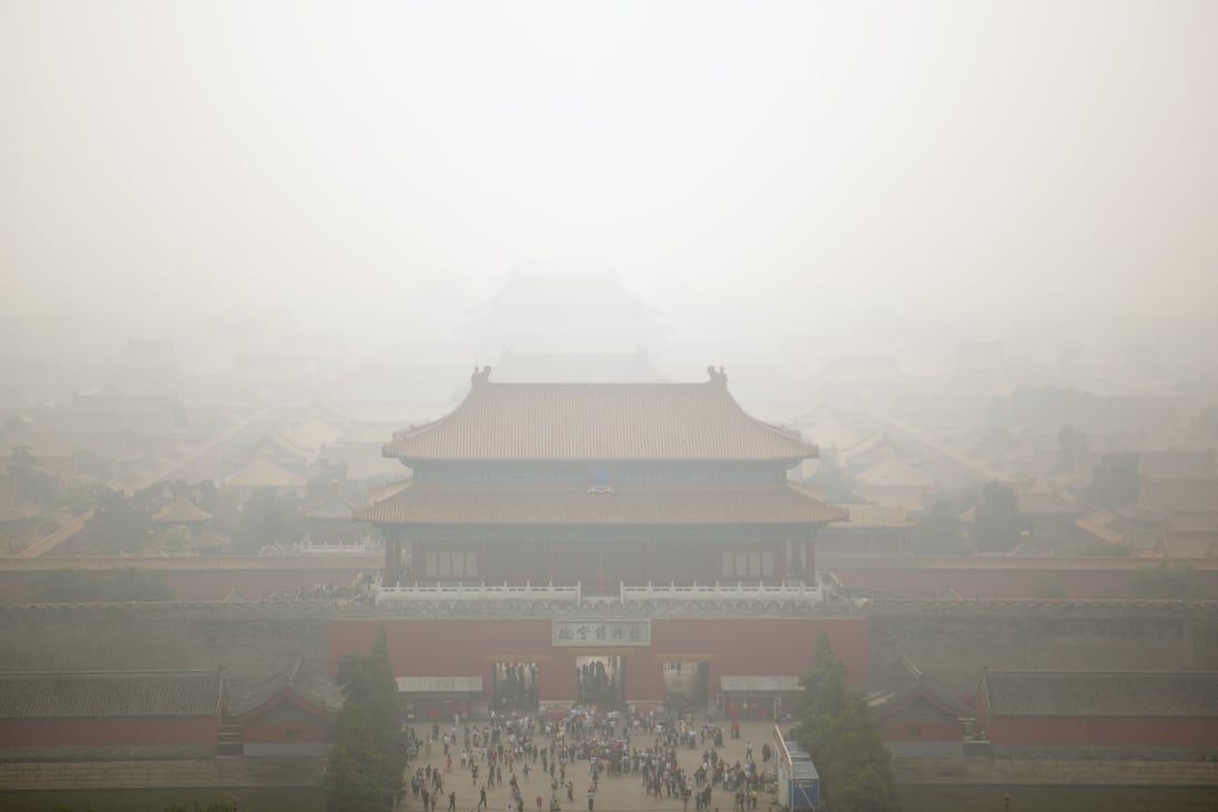 Haze surrounds the Forbidden City on a polluted day in Beijing. Photo: AP