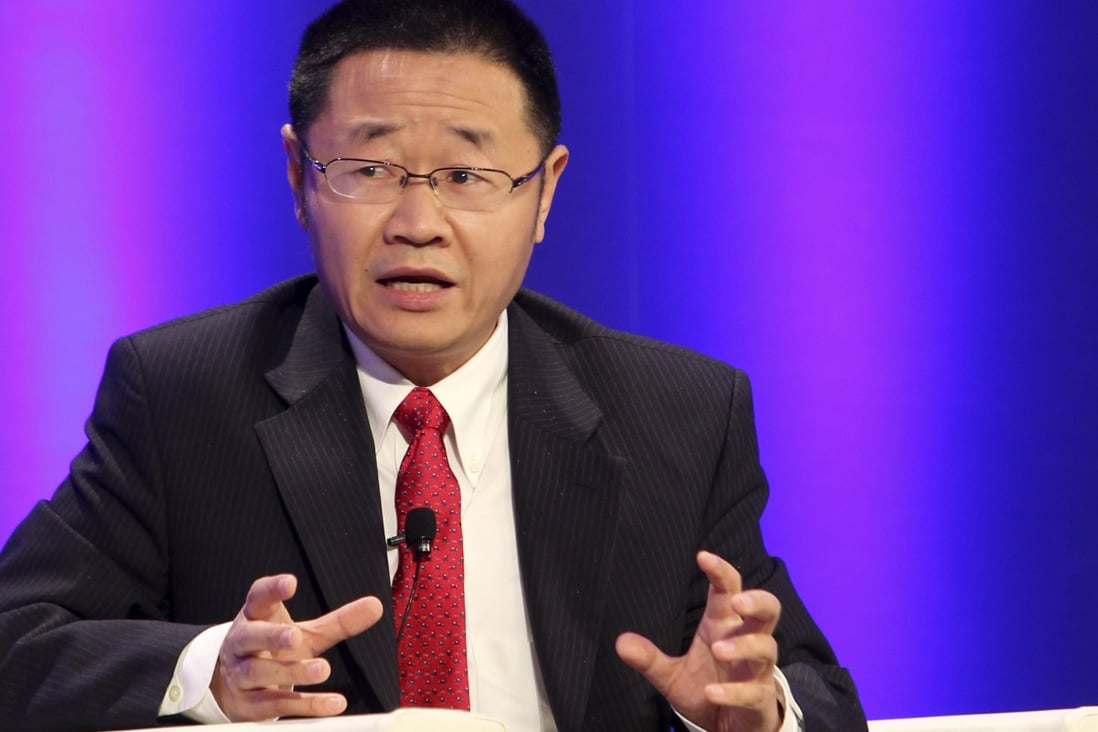Guosen Securities president Chen Hongqiao worked as a deputy under Zhang Yujun, above, the former assistant chairman of the China Securities Regulatory Commission. Photo: Reuters