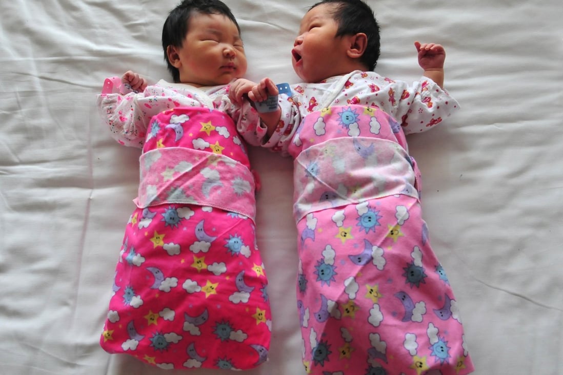 Double happiness: The shackles have been lifted from Chinese couples' reproductive wishes. Photo: AFP