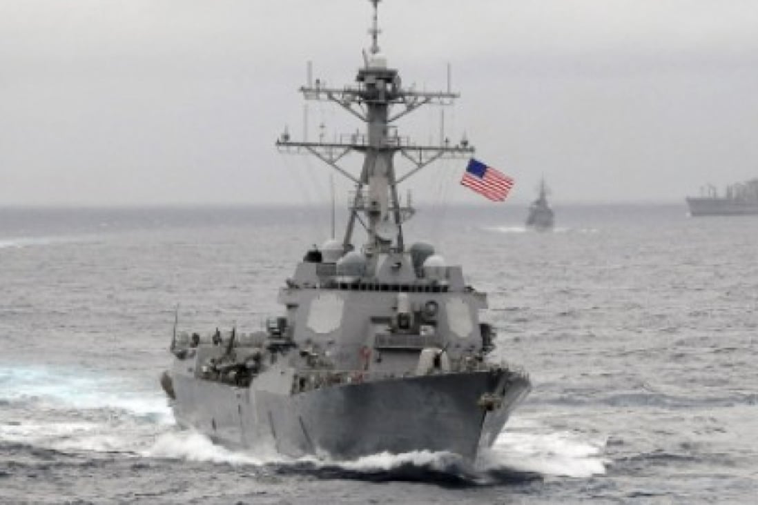 The destroyer USS Lassen patrolled inside the 12-nautical-mile (22km) limit around two Chinese-built reefs in the South China Sea on Tuesday. Photo: Reuters