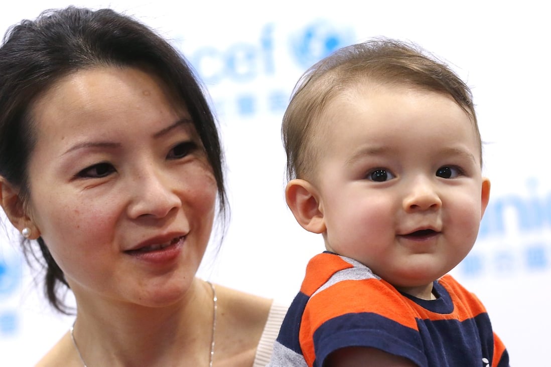 Yvonne Lam and her 10-month-old son Jamie Fulton at Unicef’s office in North Point. Photo: Edward Wong