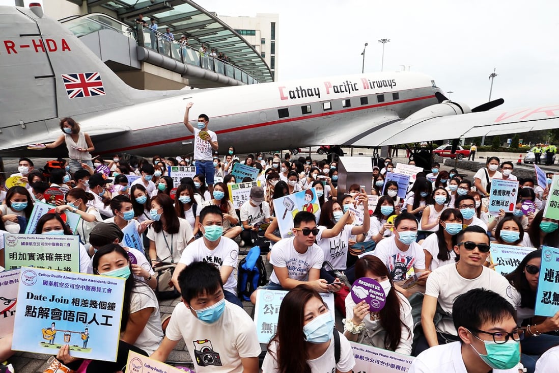 Hundreds of the airline’s flight attendants protesting in May before the latest pay deal was struck. Photo: K.Y. Cheng