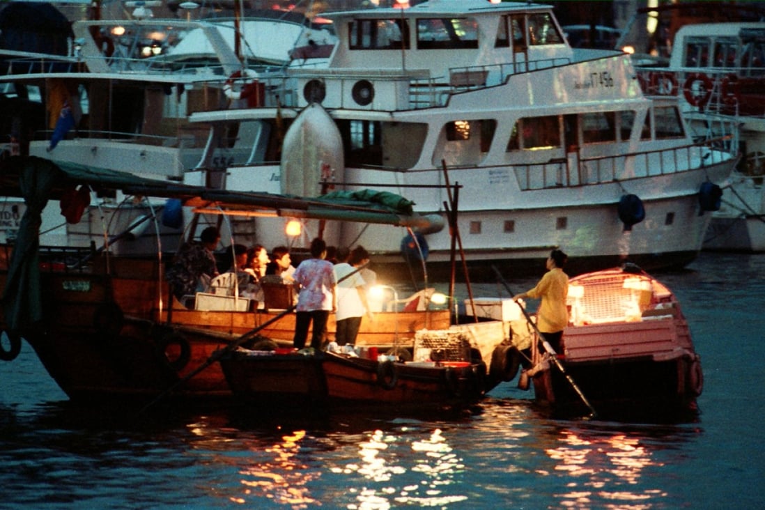 Floating seafood restaurants at the Causeway Bay Typhoon Shelter.