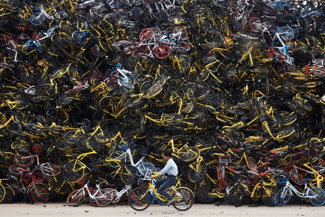 Piles of dumped bikes can be seen in many Chinese cities. (Picture: Bloomberg)