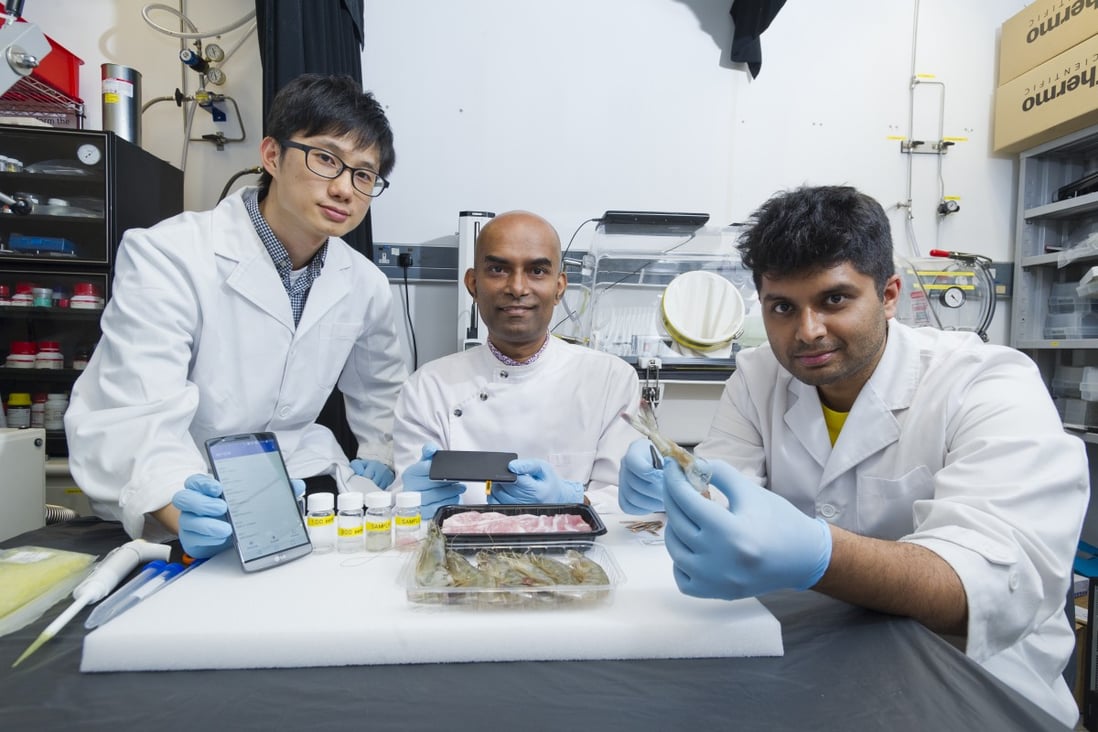 Dr Vellaisamy, Associate Professor in CityU’s Department of Materials Science and Engineering (centre) and his team.