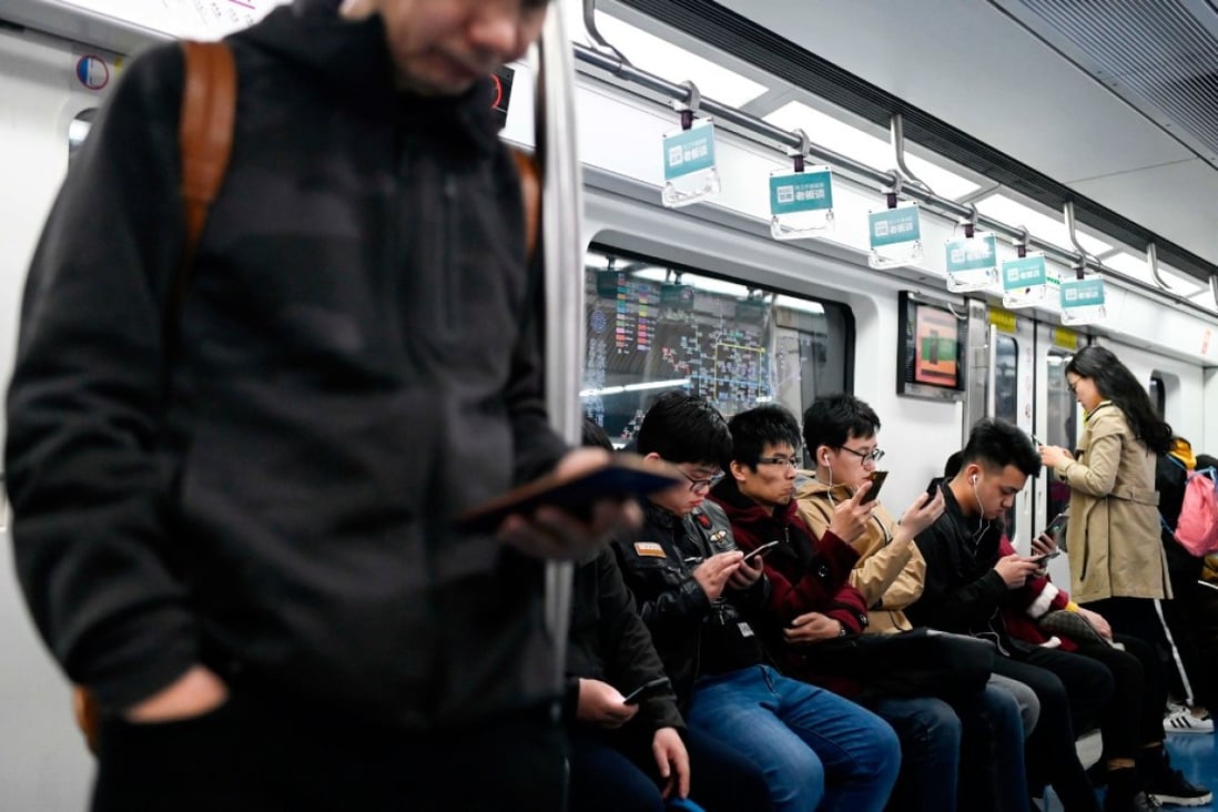 Commuters on a subway in Beijing on April 8, 2019. (Picture: Wang Zhao / AFP)