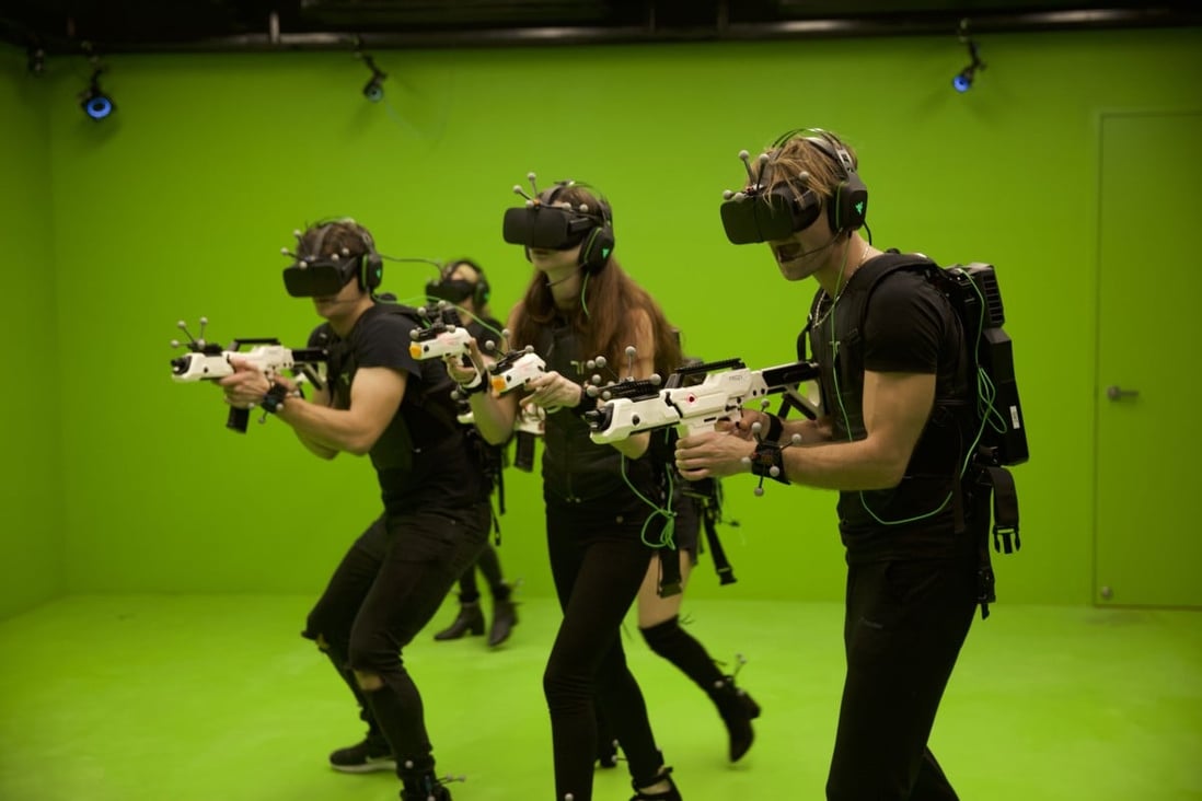 Gamers try full-body VR games at Sandbox VR.