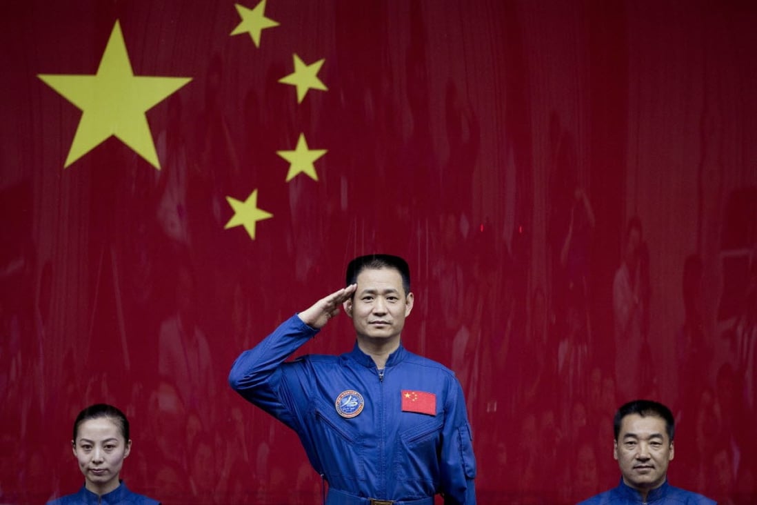 Chinese astronauts Wang Yaping, Nie Haisheng and Zhang Xiaoguang (left to right) before boarding the Shenzhou 10 spaceflight in June 2013. (Picture: AP)