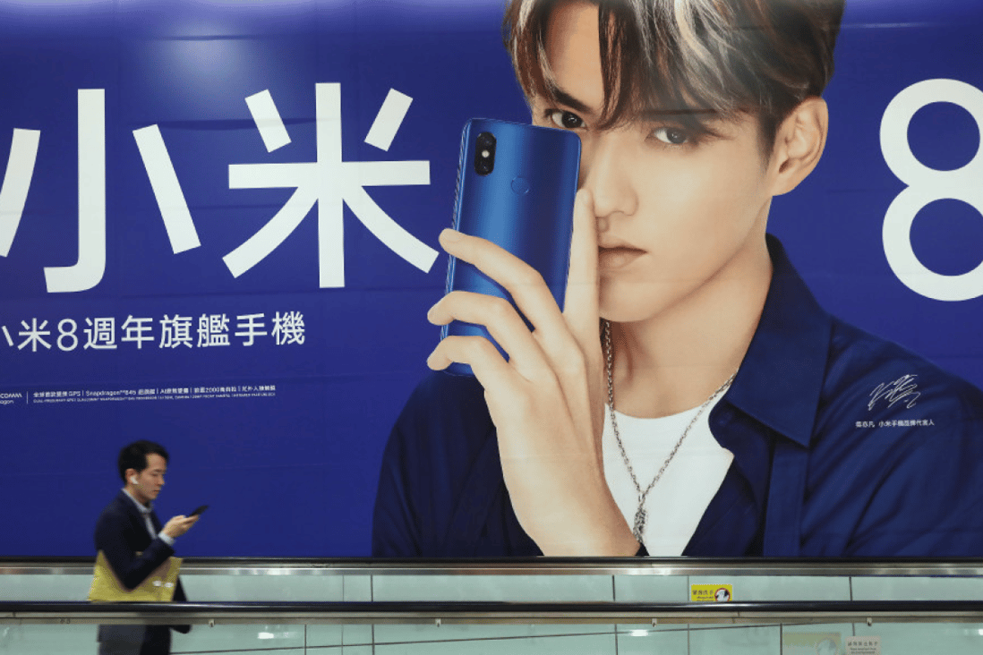 A Xiaomi billboard advertisement featuring Chinese-Canadian rapper Kris Wu. (Picture: Sam Tsang/SCMP)