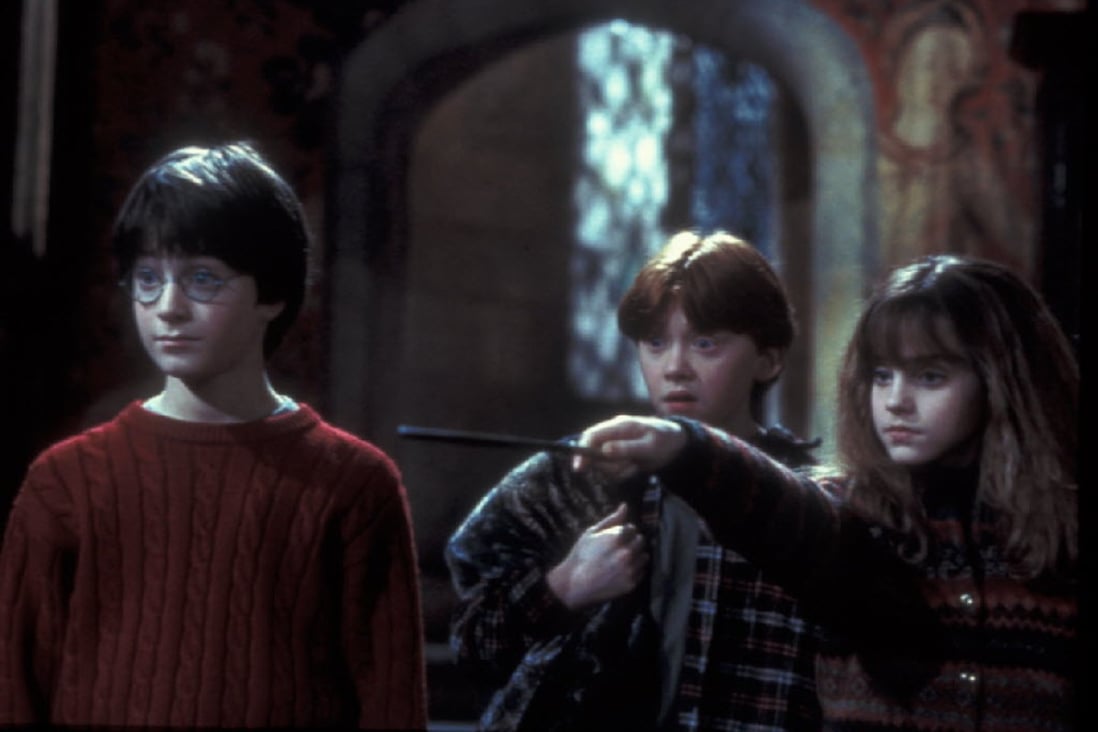 Harry Potter and the Sorcerer’s Stone grossed US$975 million worldwide when released in 2001. (Picture: Warner Bros. Pictures)