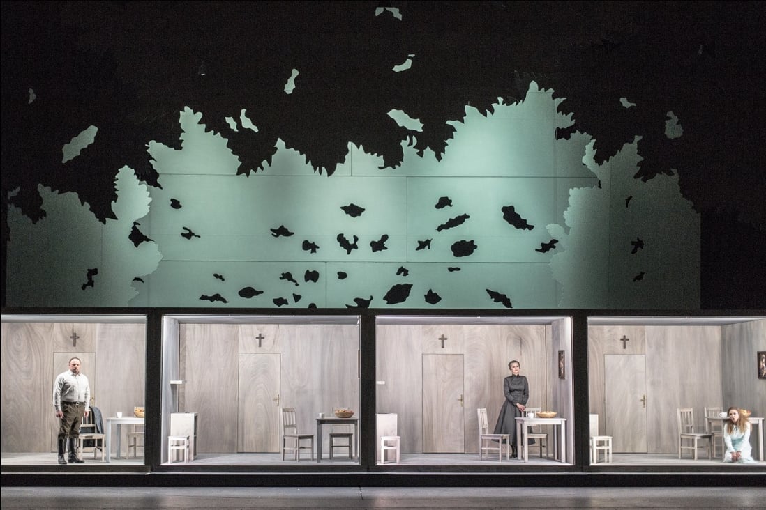A scene from Leos Janacek’s Jenufa staged by the National Theatre Brno that may bring to mind a quarantine hotel, with its four identical rooms, each with a sole occupant who’s in pain. Photo: Patrik Borecky