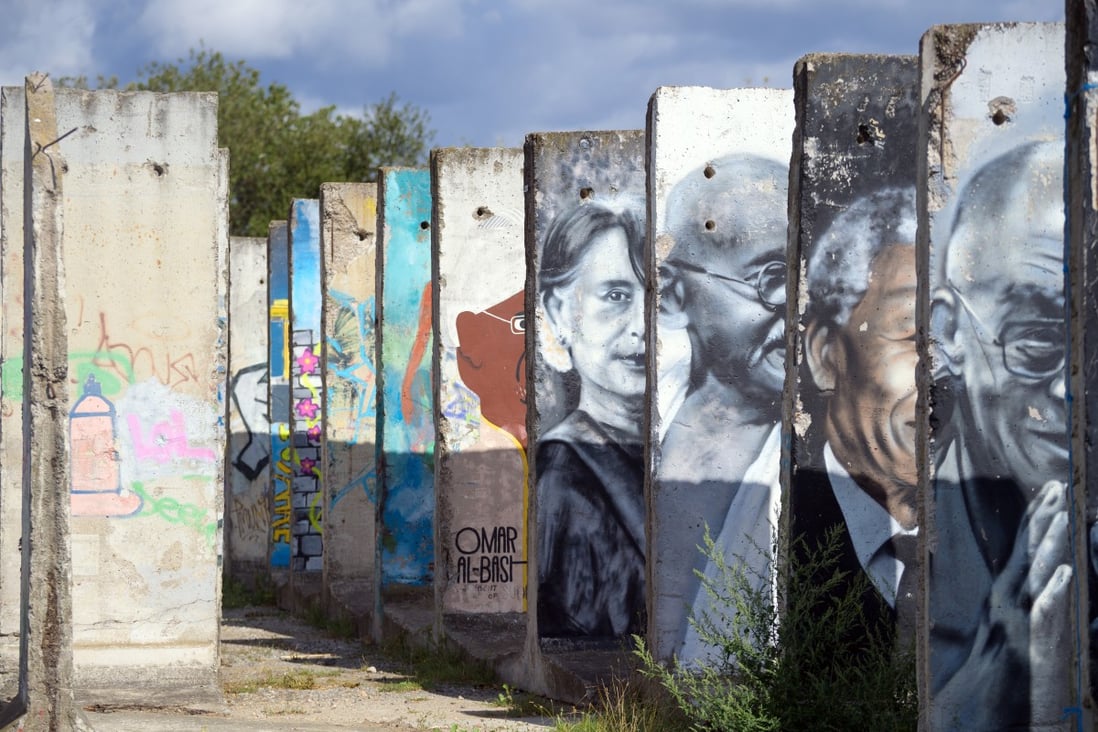 Graffitied panels of the Berlin Wall. Photo: Getty Images