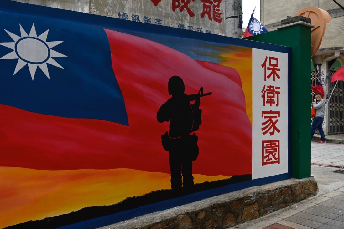 A mural which says “defend the homeland” painted on a wall on Taiwanese-controlled Quemoy island, which lies around 6km from mainland China, in the Taiwan Strait. Photo: AFP