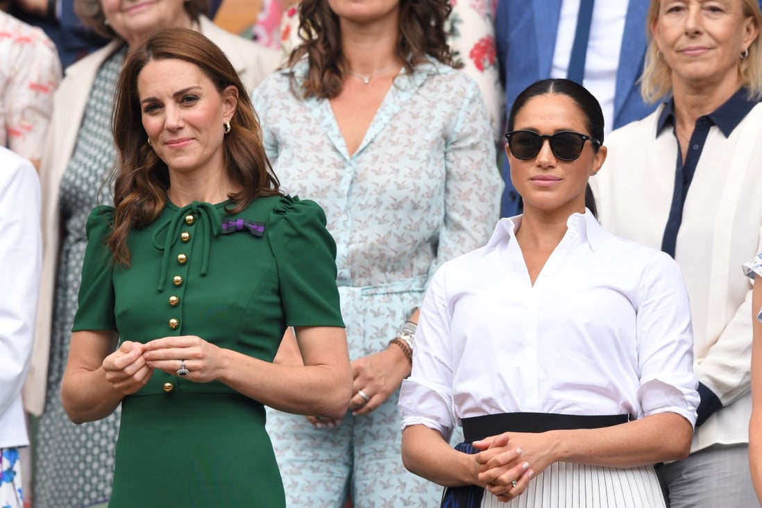 Kate Middleton and Meghan Markle in the Royal Box on Centre Court during day 12 of the Wimbledon Tennis Championships on July 13, 2019 in London, England. Photo: Getty Images