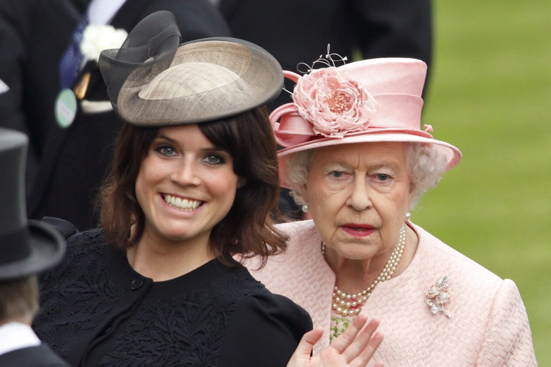 Princess Eugenie of York and Queen Elizabeth at Royal Ascot in 2013 – the princess has tried to live as normal a life as possible despite her royal status. Photo: Getty Images