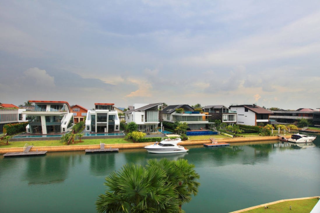 Undated handout photo of bungalows with private berths along Cove Grove from the roof terrace of a property on Pearl Island that recently sold for S$25 million in Singapore. Photo: EdgeProp Singapore.