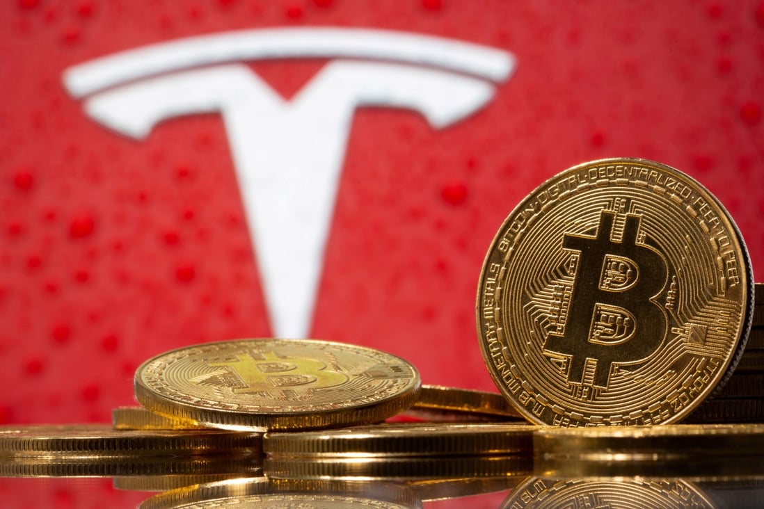 The price of both Bitcoin and Tesla has gone through the roof in the past year. Photo: Reuters 