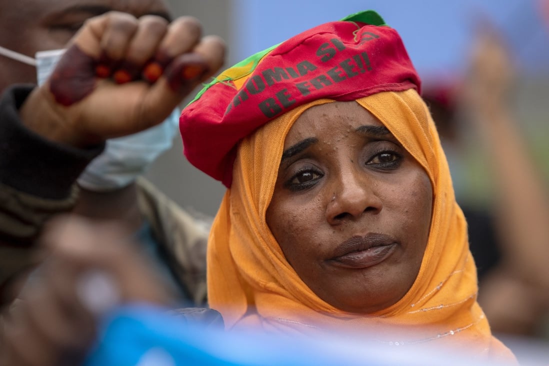 A member of the Oromo community takes part in a protest against the conflict in Ethiopia’s Tigray region, outside the European Union offices in Pretoria, South Africa, on March 25. Photo: AP