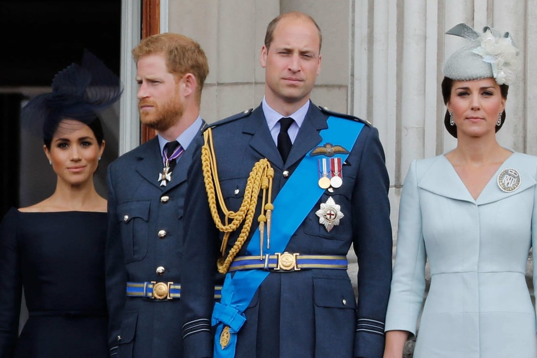 In this file photo taken on July 10, 2018 (L-R) Britains Meghan, Duchess of Sussex, Britains Prince Harry, Duke of Sussex, Britains Prince William, Duke of Cambridge and Britains Catherine, Duchess of Cambridge, stand on the balcony of Buckingham Palace on July 10, 2018 to watch a military fly-past to mark the centenary of the Royal Air Force (RAF). Photo:Tolga AKMEN / AFP