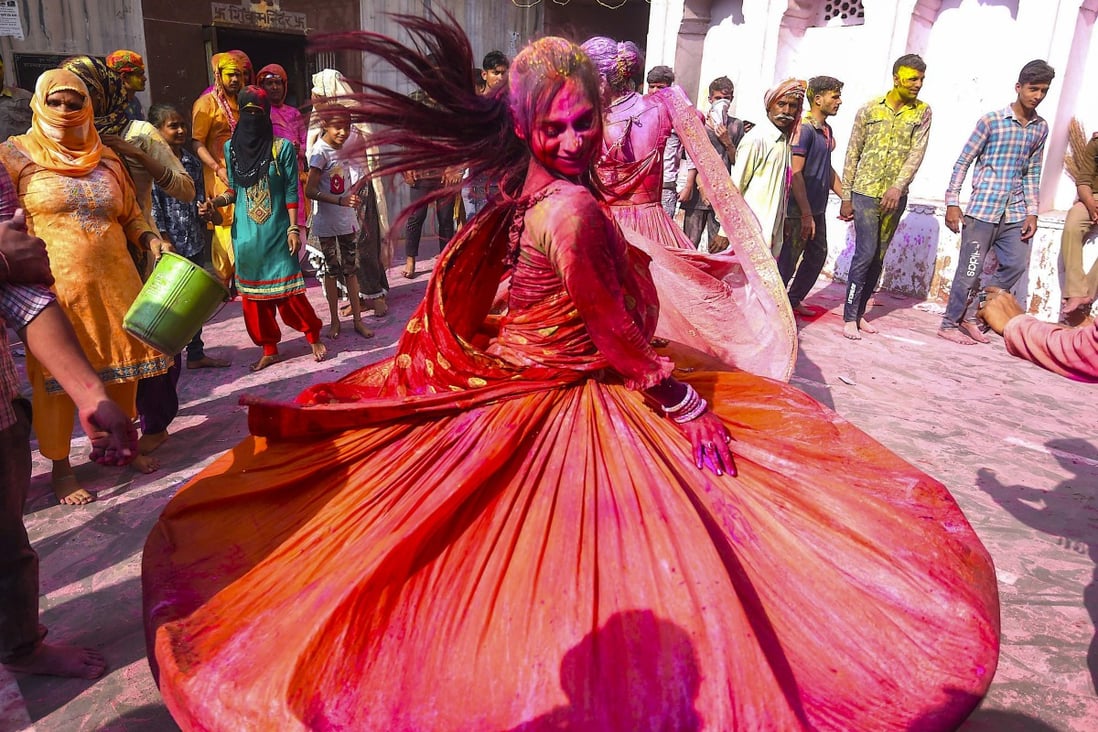 Holi celebrations in Uttar Pradesh, India, on March 5, 2020.  India, which bore the brunt of the 2013 sell-off, now enjoys a surplus instead of a gaping deficit. Across Asia, foreign exchange reserves are at record levels, while inflation remains nailed to the floor. Photo: AFP