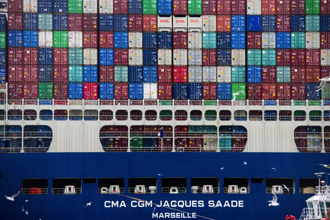 Containers are stacked aboard an LNG-powered ship at the port of Le Havre in France on January 21. The European Commission plans to include shipping in its emissions trading system. Photo: Bloomberg