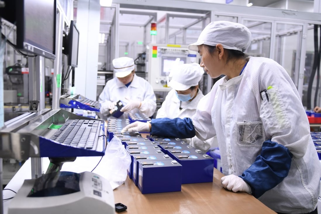 Workers check products at Contemporary Amperex Technology Co Ltd, the world's biggest maker of electric vehicle batteries, at the company's factory in Ningde, southeast China's Fujian province. Photo: Xinhua