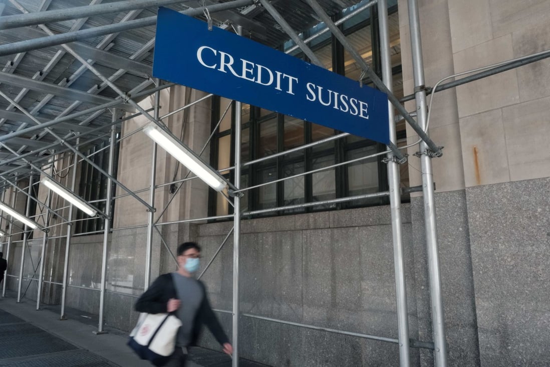 A Credit Suisse sign hangs outside its Manhattan office on March 29, 2021 in New York City. Photo: AFP