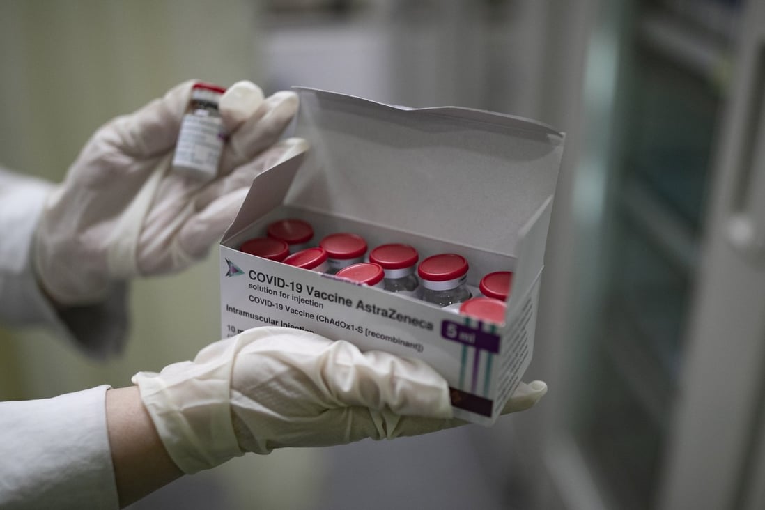 A health worker holds a box of the AstraZeneca Covid-19 vaccine manufactured in South Korea. A spike in cases has led to concerns about securing domestic vaccine supply. Photo: EPA-EFE