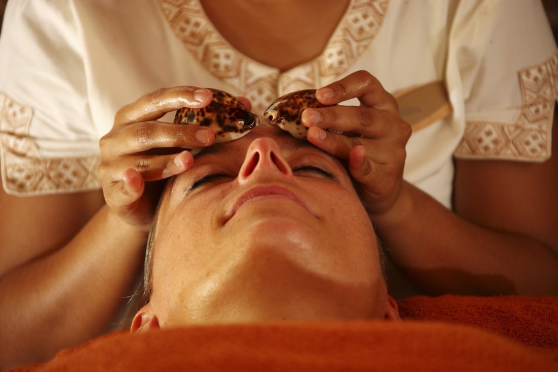 The therapeutic power of Ayurveda helped two women overcome physical and mental pain. The Indian traditional medicine combines detoxication and herbal treatments with meditation, chanting, and yoga. Photo: Getty Images