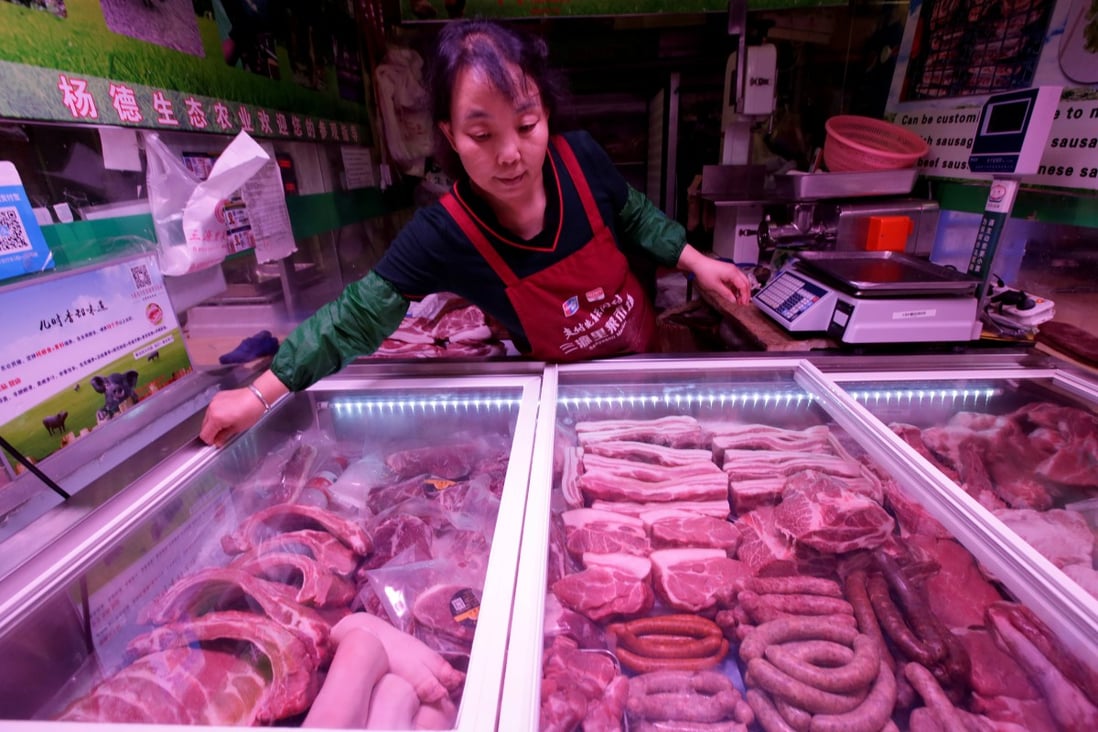 The wholesale price of pork, a staple food among Chinese households, could remain volatile this year. Photo: Reuters