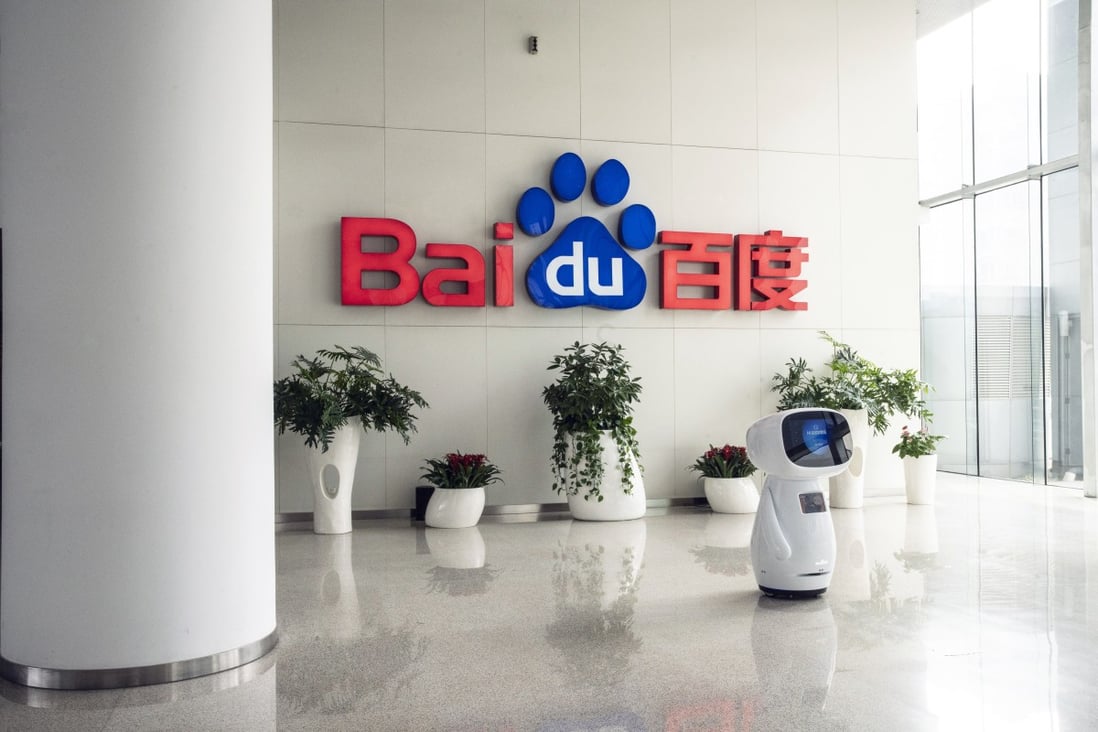 An artificial intelligence robot in front of the the Baidu logo at the company’s headquarters in Beijing, China, on March 4, 2021. Photo: Bloomberg