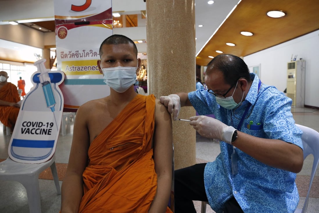A Thai Buddhist monk receives a shot of Covid-19 vaccine developed by AstraZeneca in Bangkok on Friday. Photo: EPA