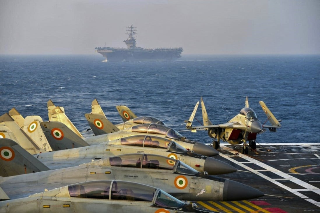 Indian army fighter jets on an aircraft carrier during the Malabar naval exercise in 2020, in which Australia, Japan and the US - the other countries in the Quad - also took part. Photo: AFP