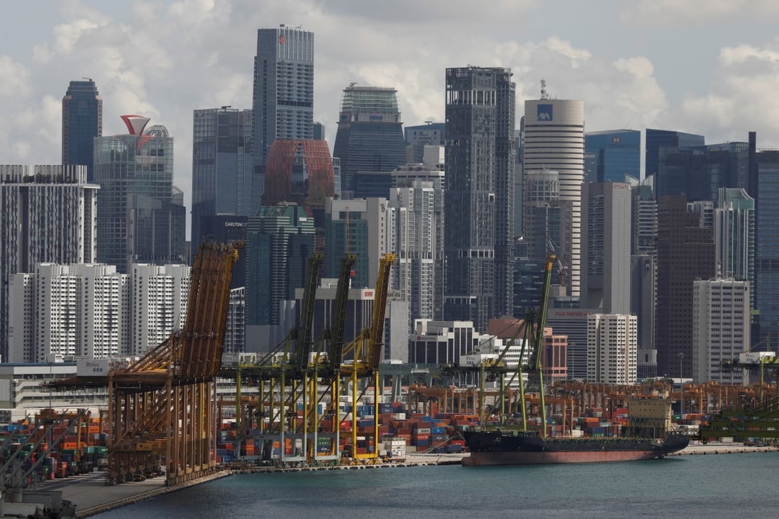 A ship docks at Keppel terminal in Singapore. The country’s manufacturing sector has grown, even though the services and construction sectors are still sluggish, according to economists. Photo: Reuters