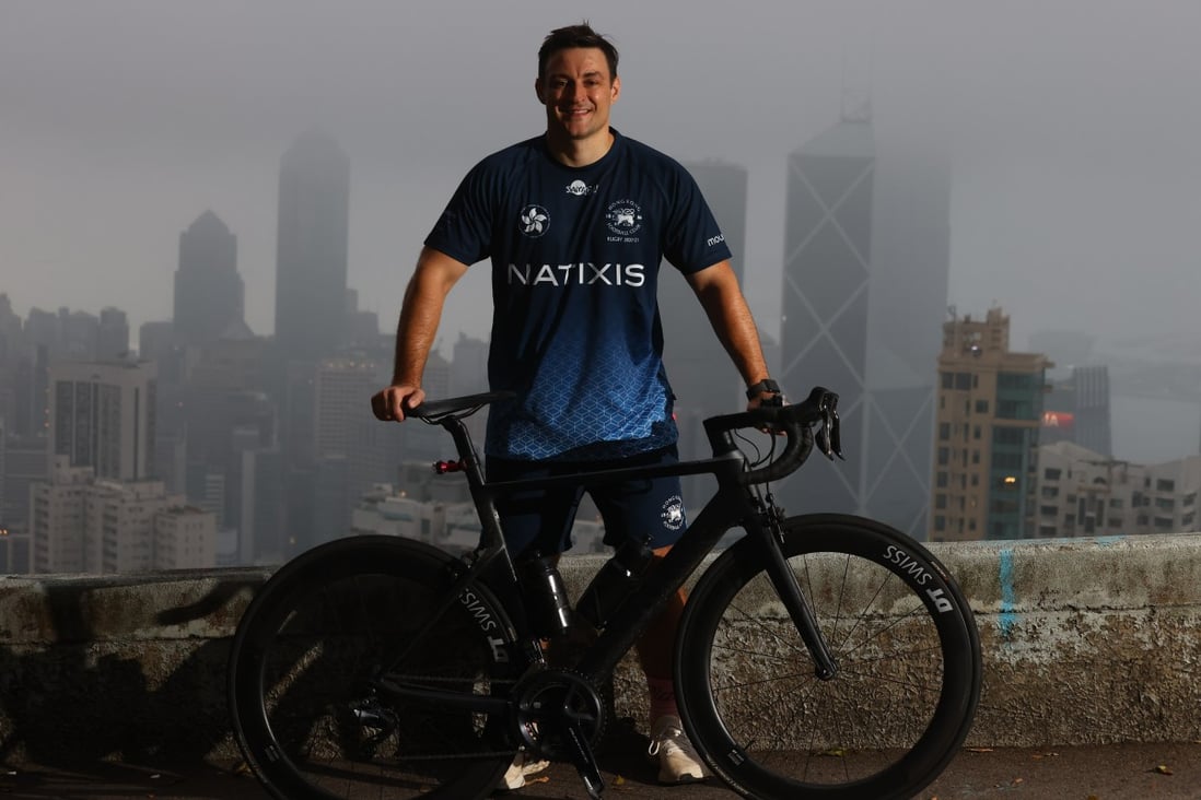 Hong Kong Football Club senior rugby player John McCormick-Houston with his bike on Magazine Gap, Mid-levels to raise money for the HKFC Rugby to Hanoi charity programme in April. Photo: SCMP / Dickson Lee  