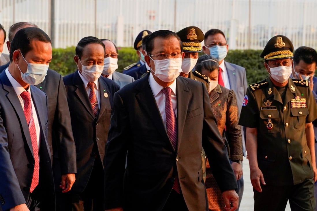 Cambodian Prime Minister Hun Sen arrives to receive a shipment of 600,000 doses of the coronavirus vaccines donated by China. Photo: Reuters