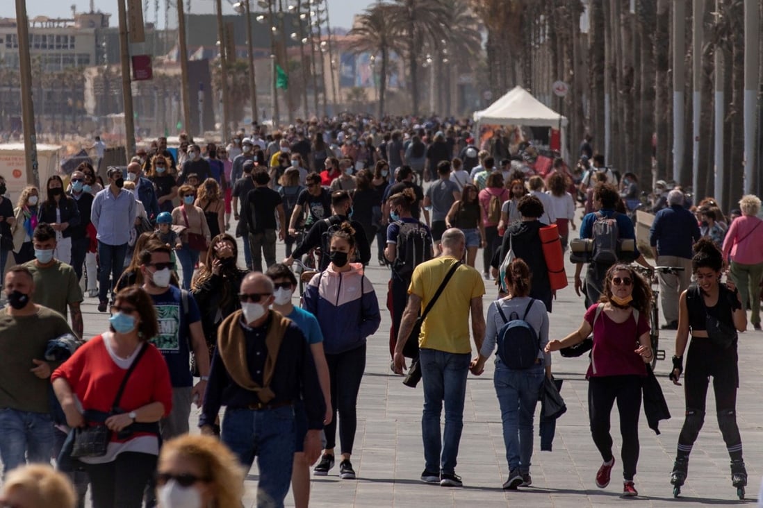 A packed Barcelona beach promenade. Covid-19 deaths and illnesses keep increasing globally, jeopardising efforts for a return to pre-pandemic life. Photo: EPA-EFE