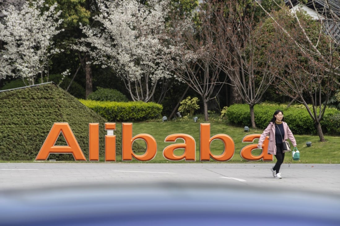 A person walks past a signage of Alibaba at the company’s headquarters in Hangzhou, China, on March 24, 2021. Photo: Bloomberg