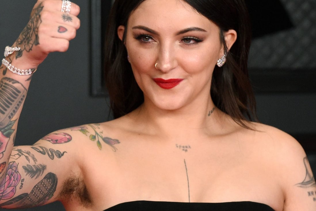 Singer and songwriter Julia Michaels, wearing a strapless Georges Chakra couture gown, bares her armpit hair on the red carpet at last month’s Grammys at the Los Angeles Convention Centre in the US. Photo: Getty Images