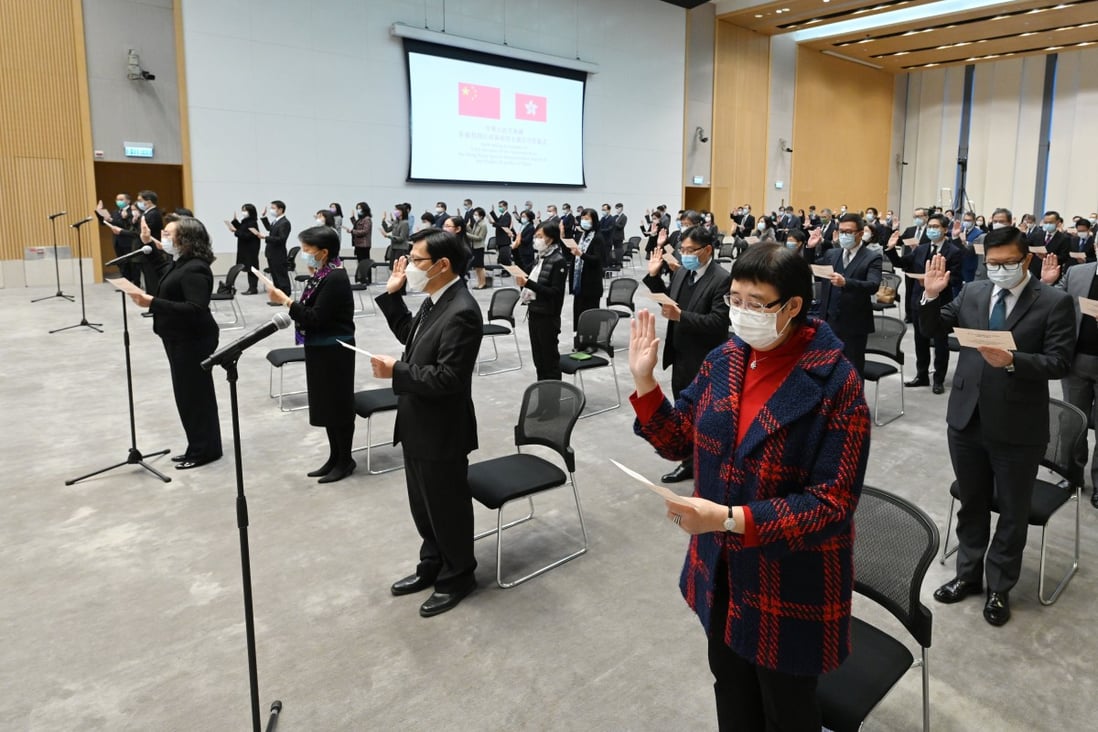 Senior civil servants take a pledge of allegiance to Hong Kong at government headquarters on December 18, 2020. Photo: ISD 