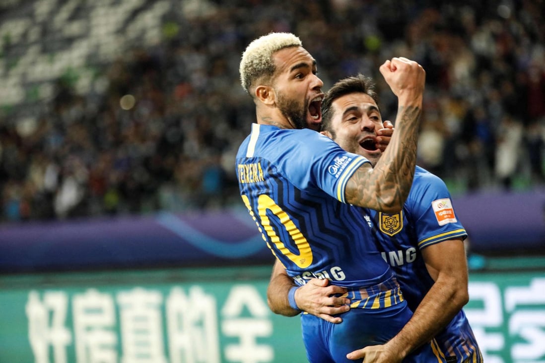 Jiangsu Suning’s Alex Teixeira (left) and Eder celebrate after winning the 2020 Chinese Super League final. The team left the CSL ahead of the 2021 season. Photo: AFP