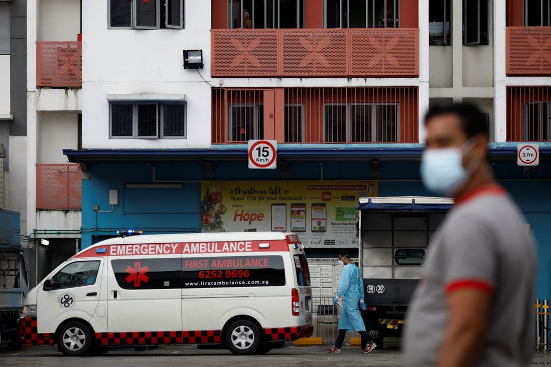 An ambulance parked in front of the Westlite Woodlands dormitory in Singapore. Photo: Reuters