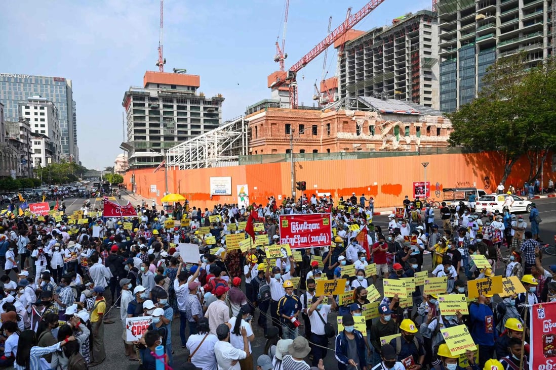 Railway workers protest to demand the release of detained civilian leader Aung San Suu Kyi in Yangon on February 19, 2021. Photo: AFP