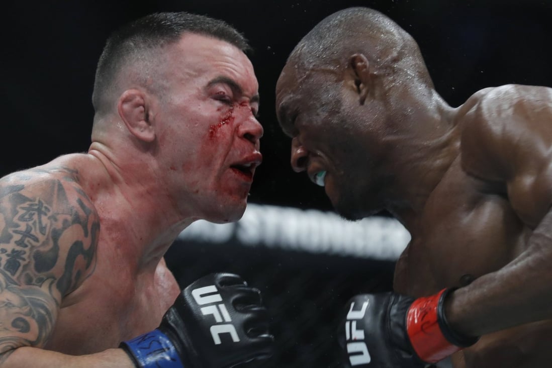UFC welterweight champion Kamaru Usman throws punches in the fifth round with contender Colby Covington in their title fight at UFC 245 in the T-Mobile Arena in Las Vegas, Nevada in 2019. Photo: AFP   