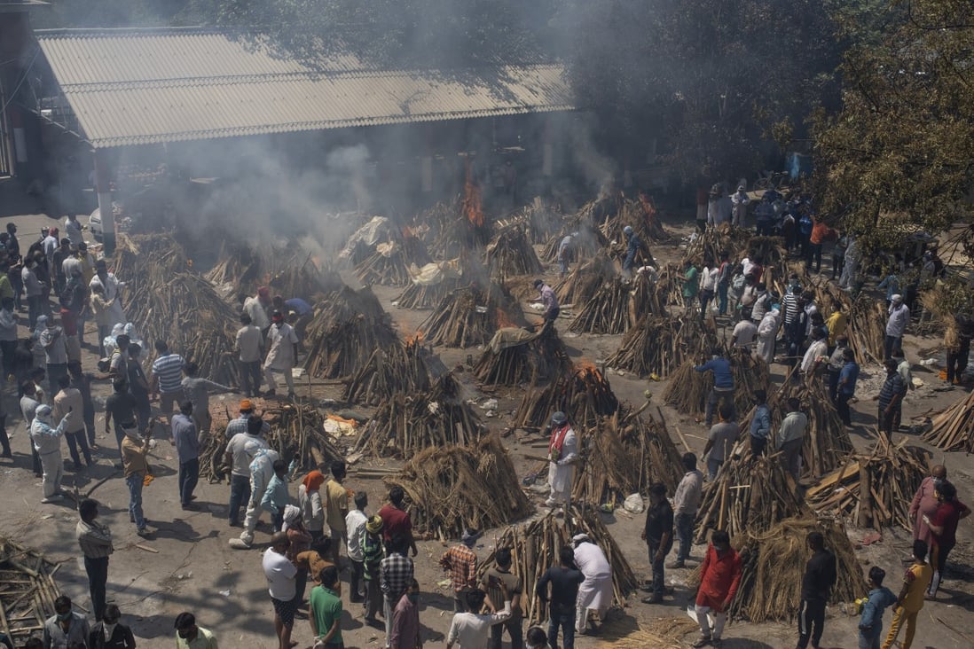 Multiple funeral pyres at a makeshift crematorium in New Delhi, India, where the Covid-19 pandemic is surging. Photo: AP