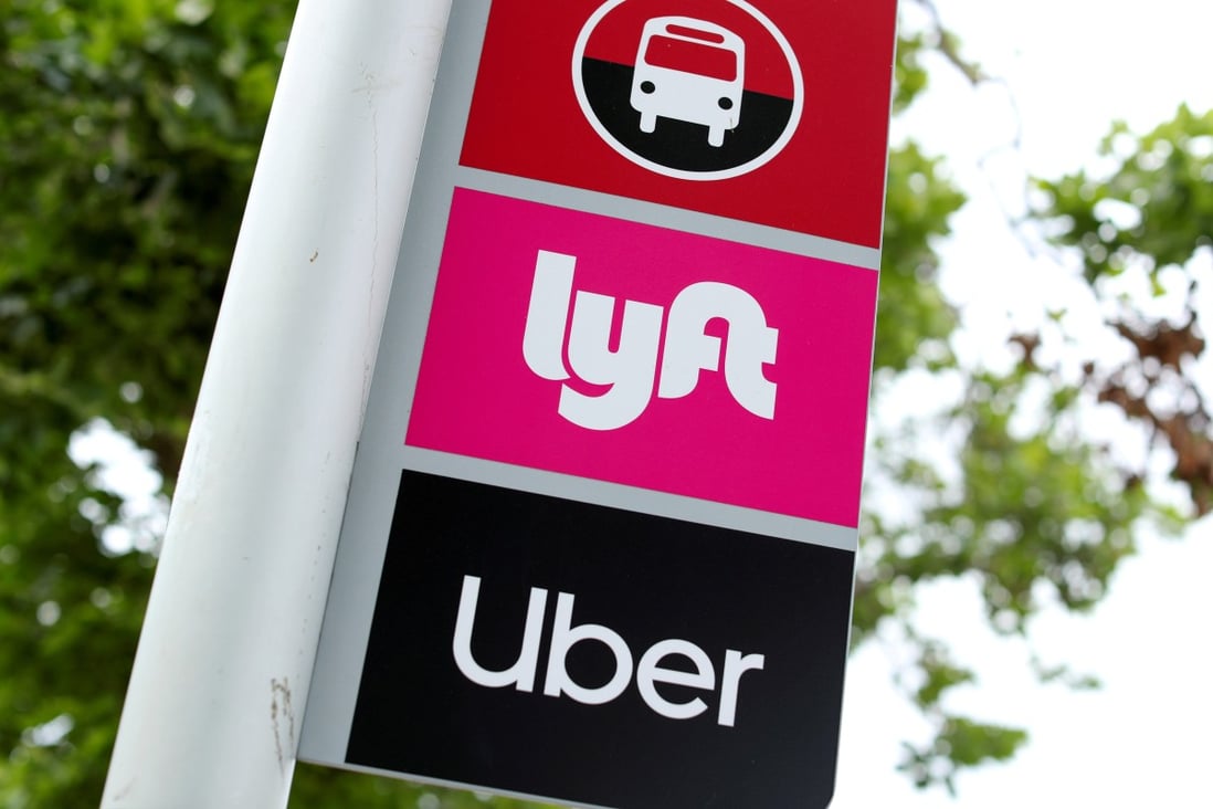 A sign marks a rendezvous location for Lyft and Uber users at San Diego State University in San Diego, California. Photo: Reuters